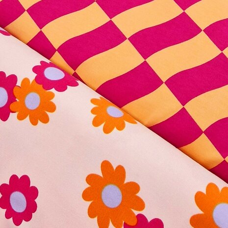 Daisy flowers babycord en french terry roze fuchsia oranje KicKenStoffen